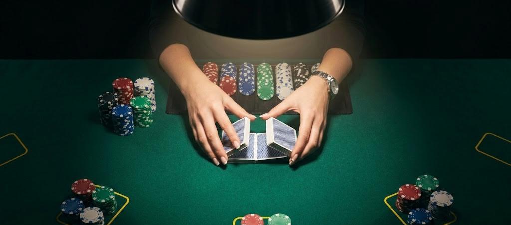 Professional poker table with casino chips and playing cards
